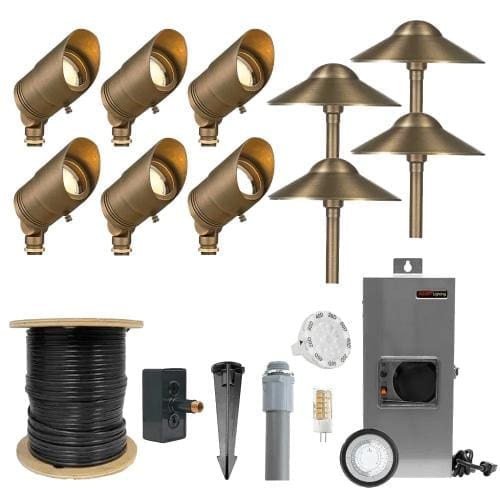 A collection of outdoor landscape lighting components, including eight spotlights, four path lights, a spool of black wire, a transformer, a power stake, and a timer.