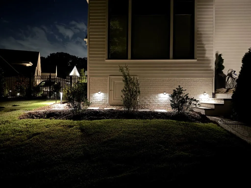 a home with pathway lighting, installed by Sunset Lights in Raleigh, NC.