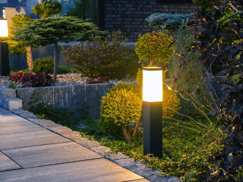 solar powered light on pathway. image accompanies the blog addressing the average cost of landscape lighting in Raleigh, NC.