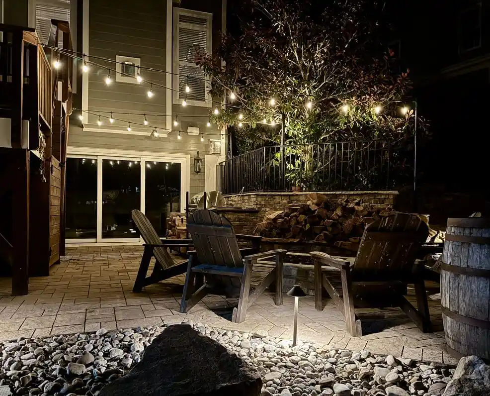 Bistro light installation at night in Raleigh, NC.